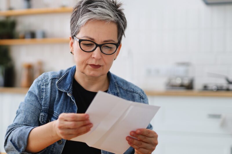 Woman reads eviction notice